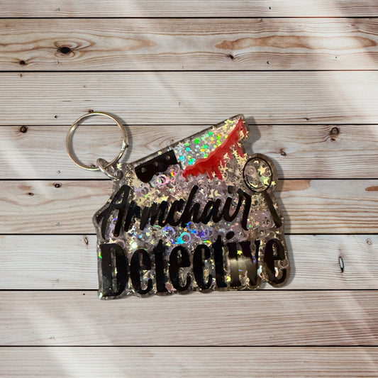 Glitter Acrylic Keychain - Armchair Detective
